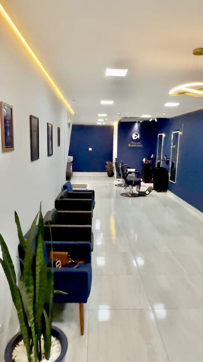 Área de espera da Nauta Barbearia